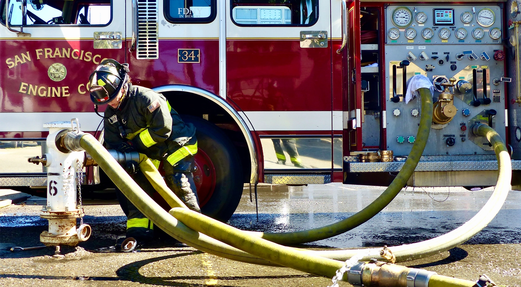 sffd fire engine with hoses