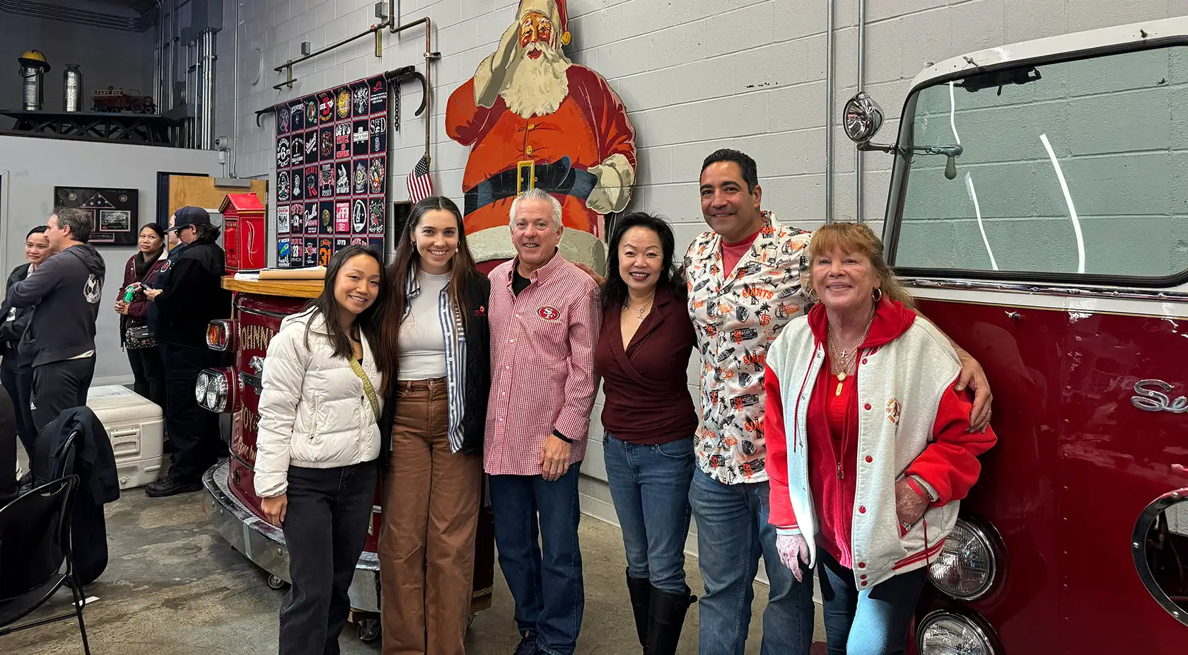 Group shot of team inside a firehouse