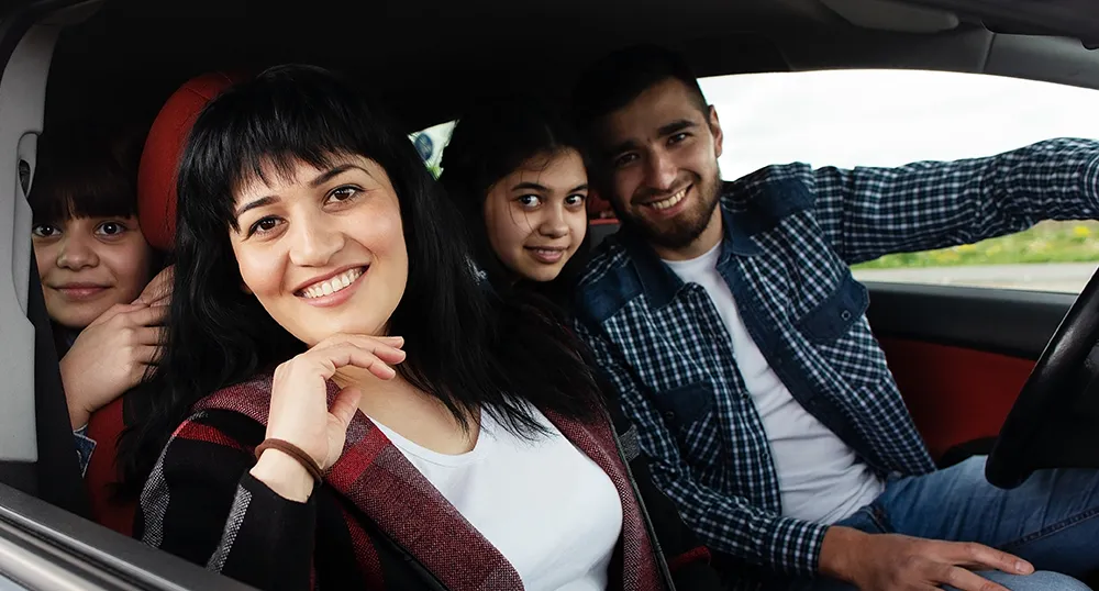 family in their car