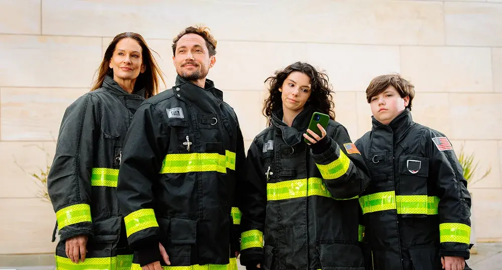 family dressed in firefighter gear