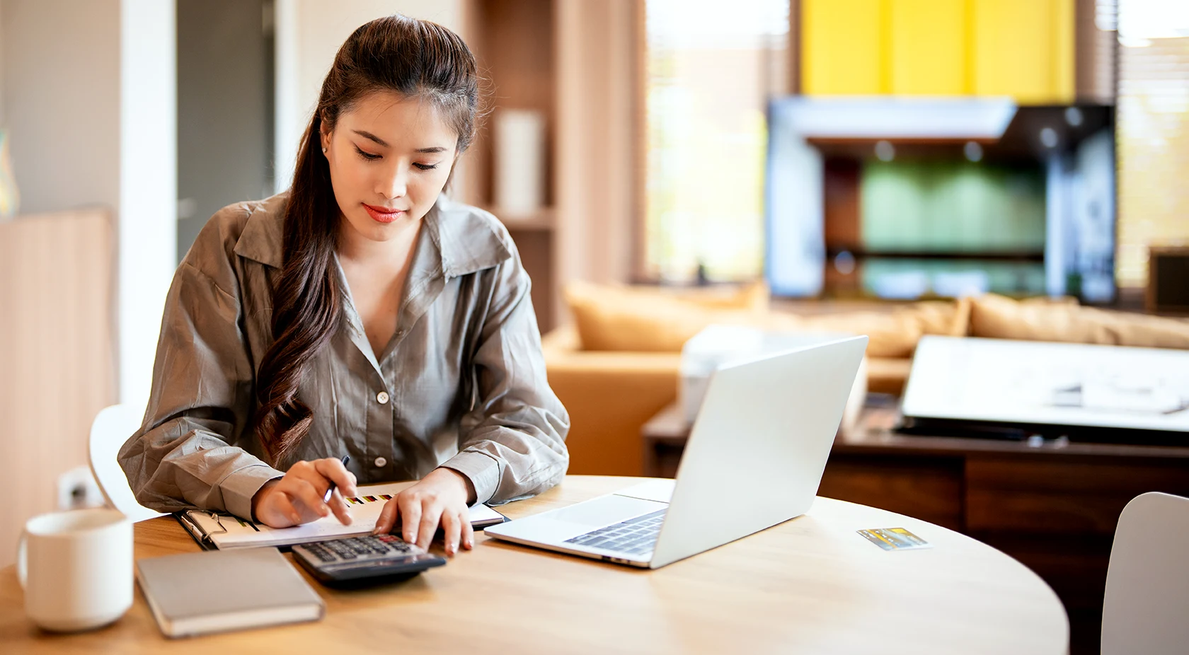Woman on calculator