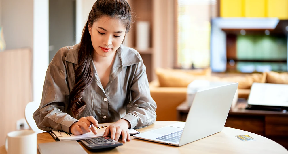 Woman on calculator