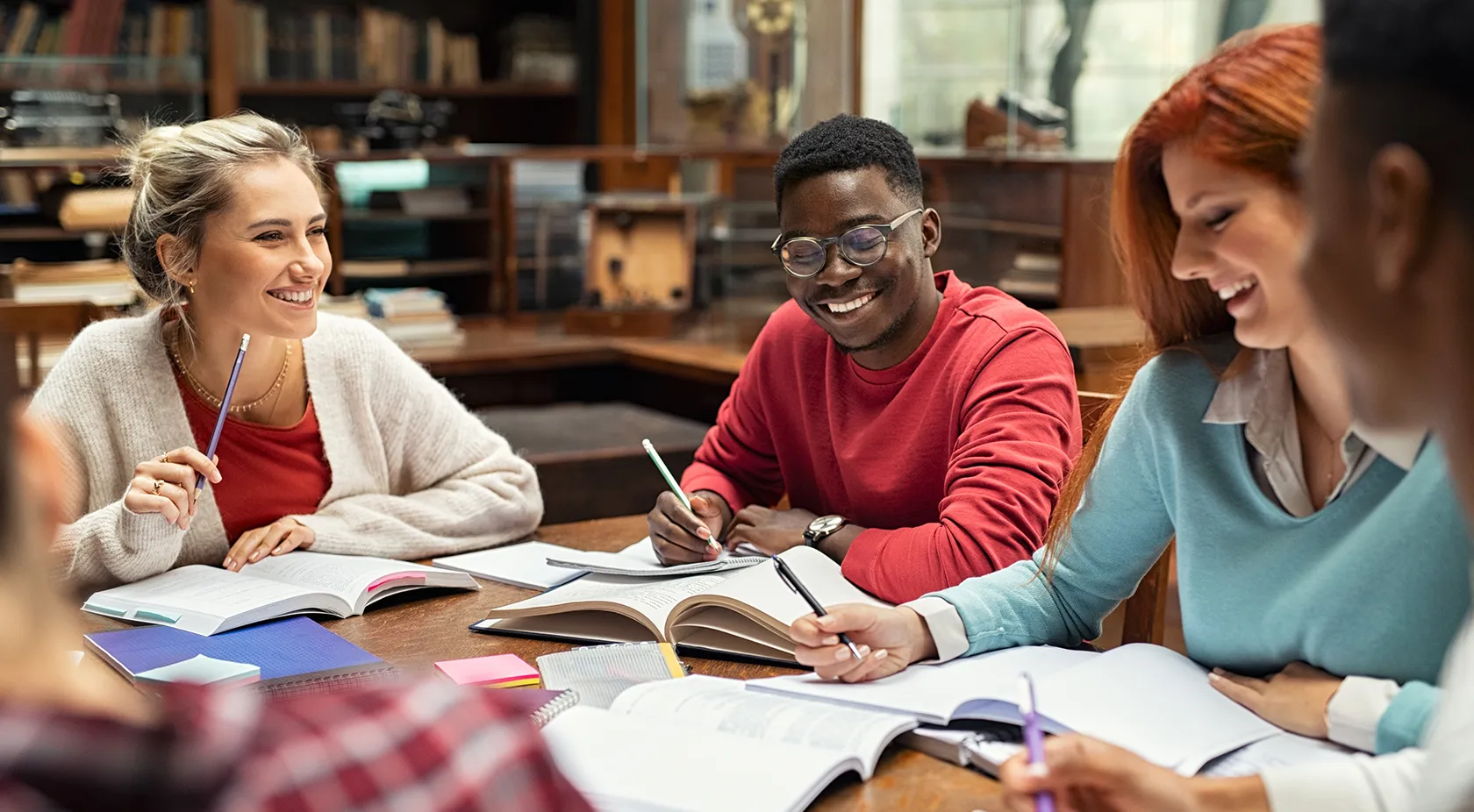 Group of students doing homework together