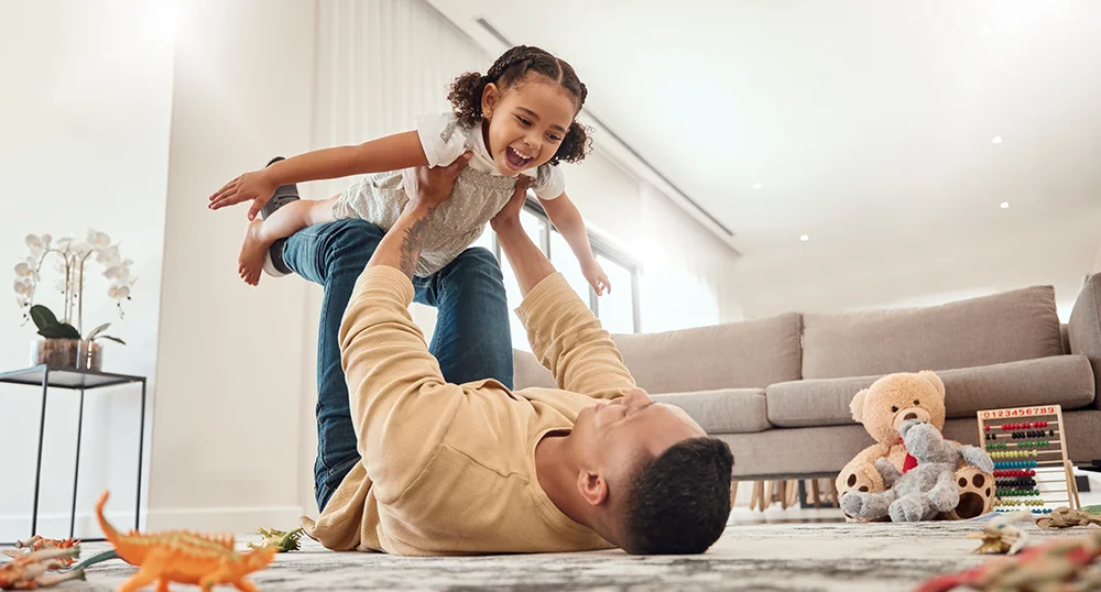Father playing with daughter