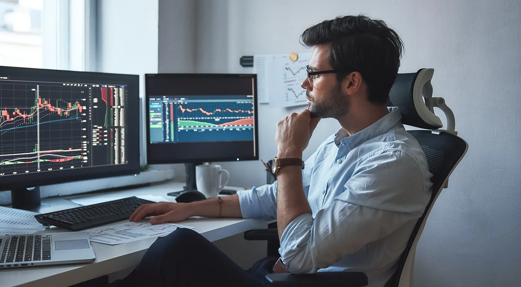 Man looking at stock market