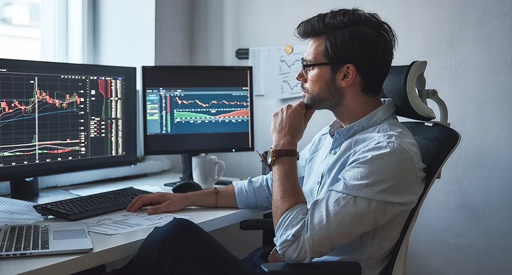 Man looking at stock market