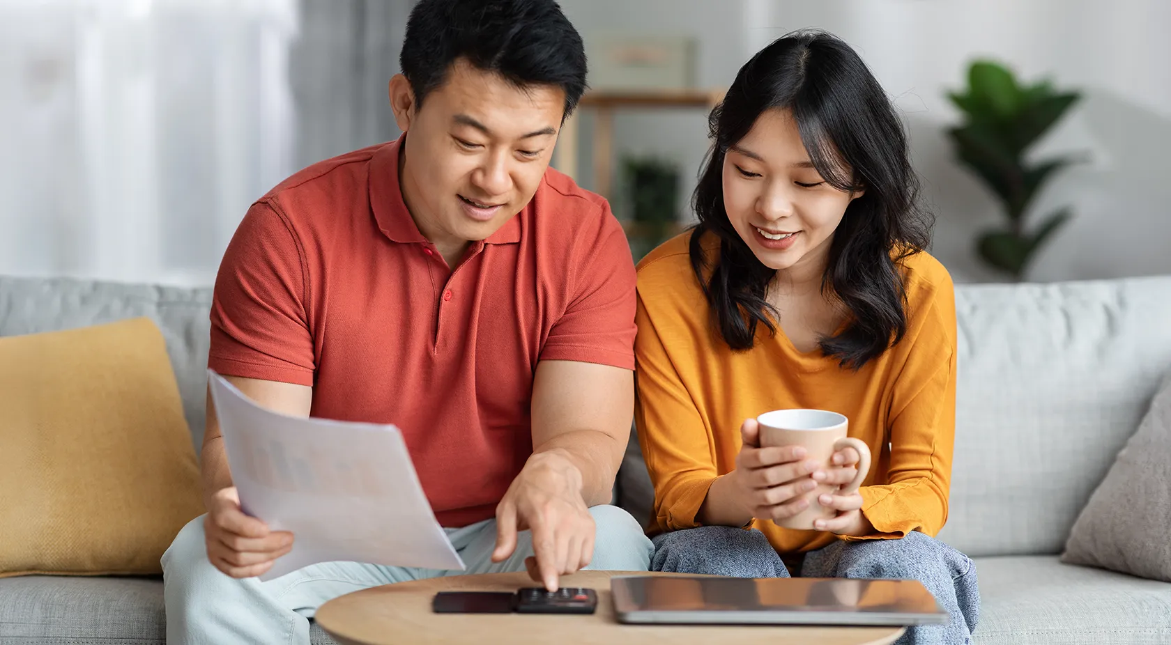 Couple looking at paper