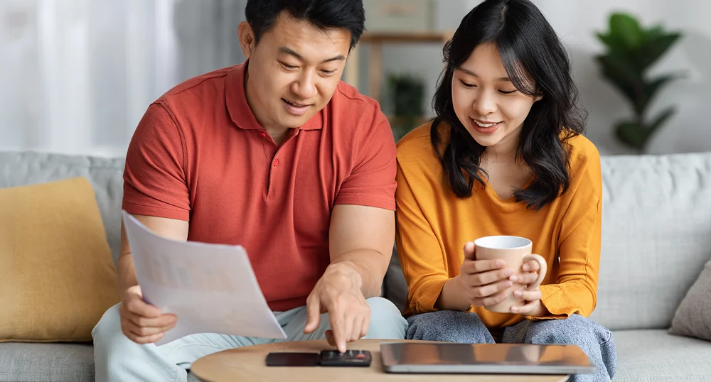 Couple looking at paper