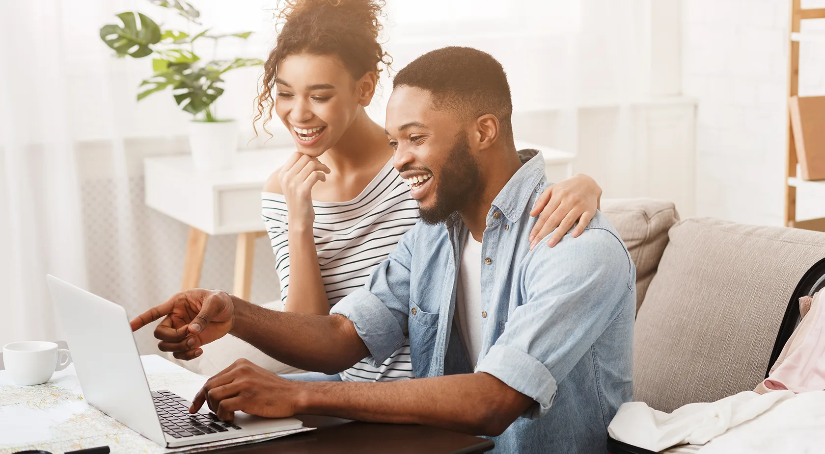 couple happy on laptop