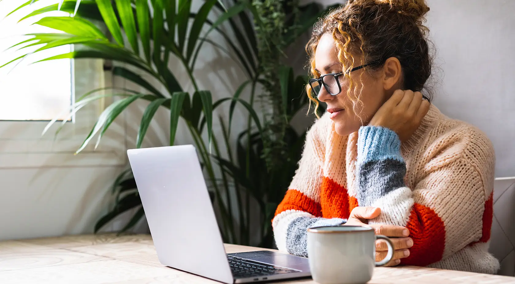 woman looking at laptop