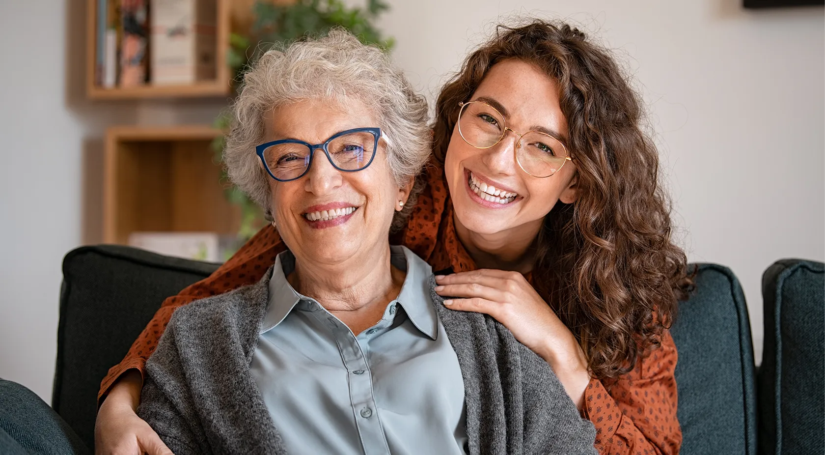 Mother and Daughter hugging and smiling