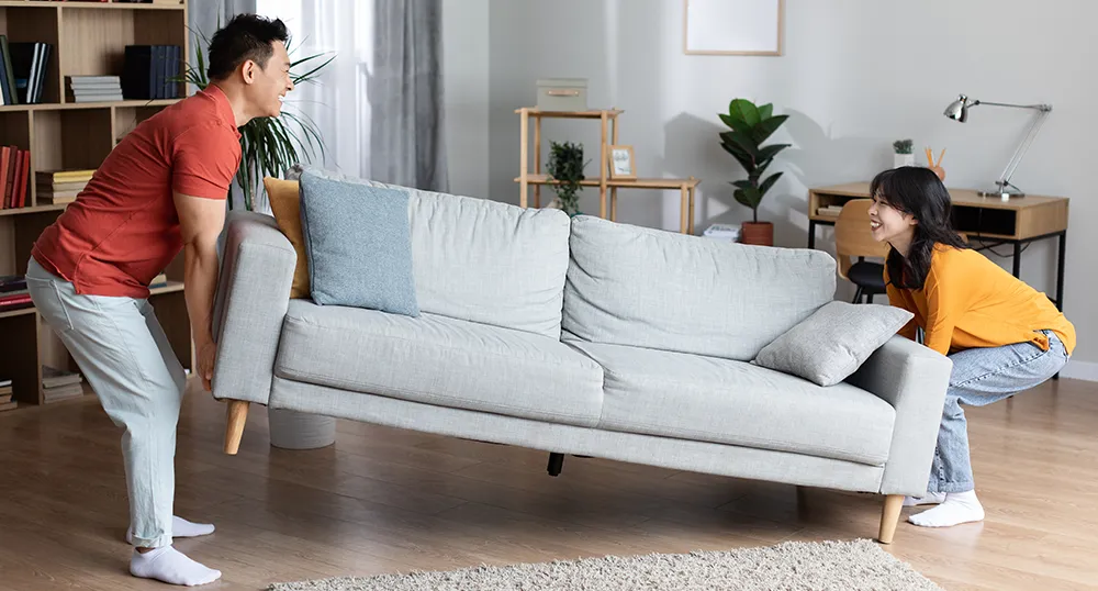 Couple moving their couch