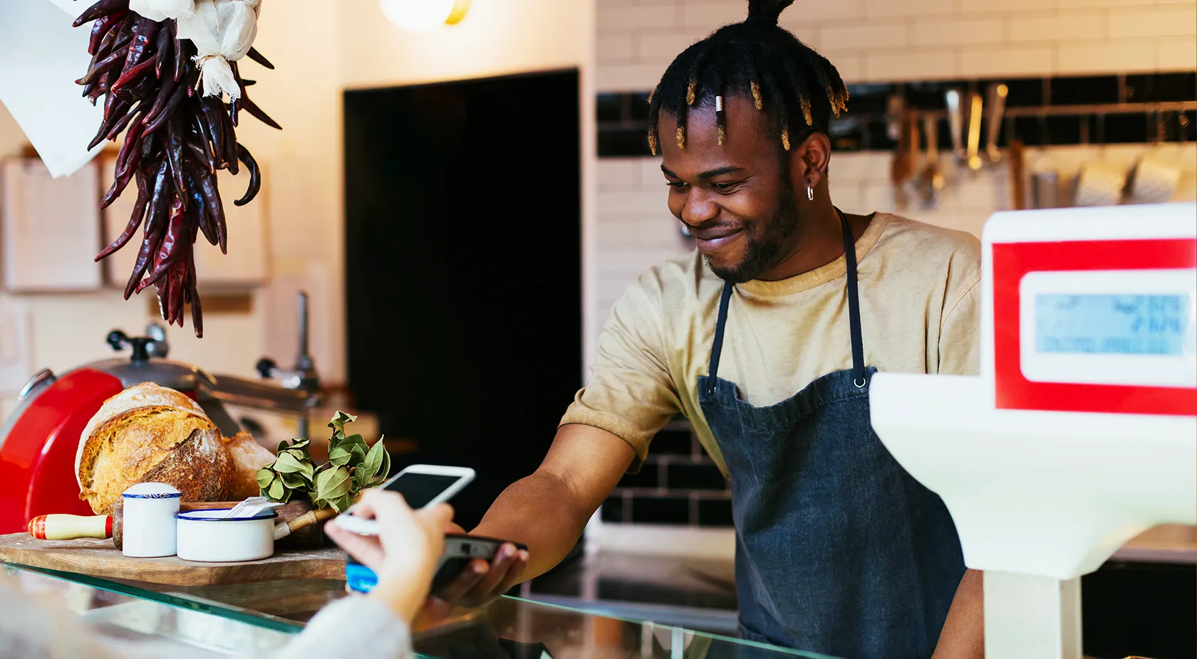 Business owner taking digital payment