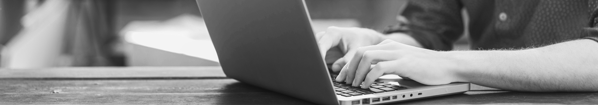 image of member at a laptop