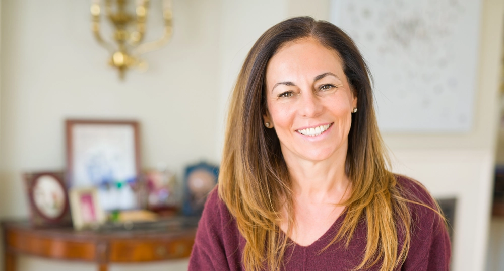 Smiling lady in her home