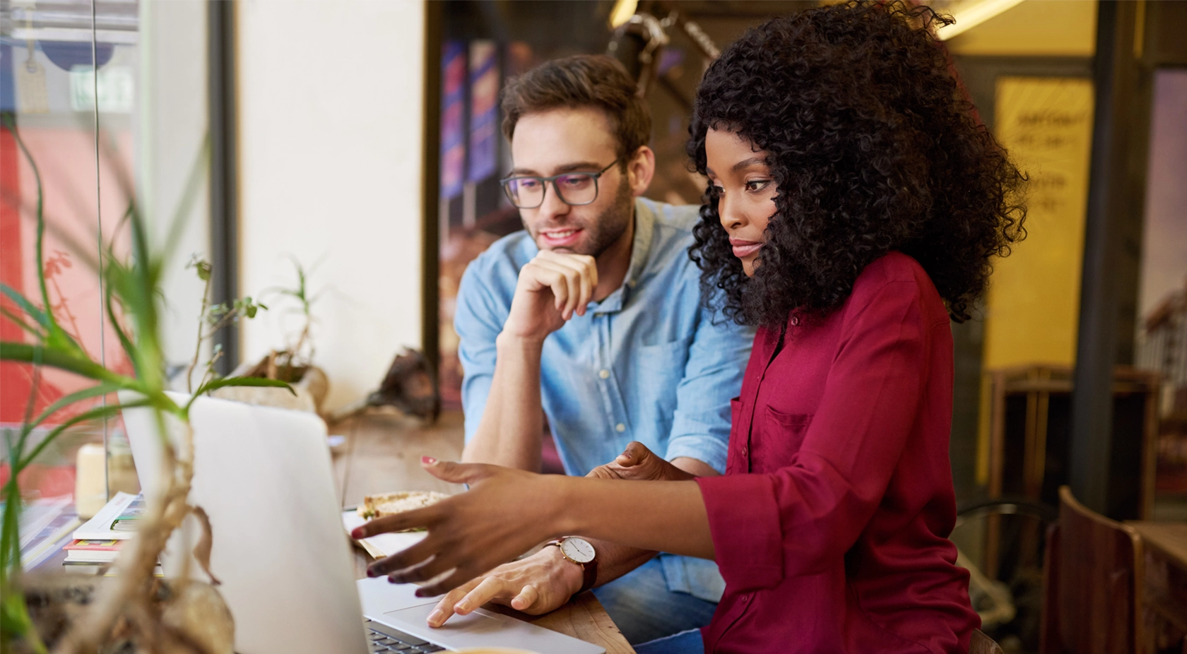 man and woman at laptop